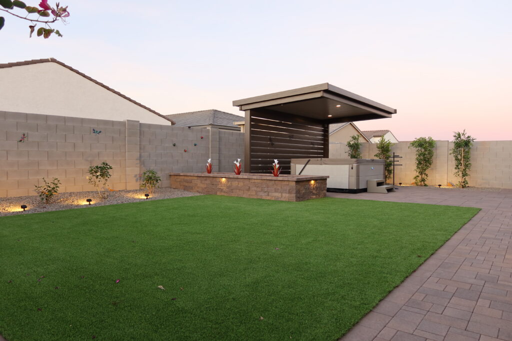Spa, turf, and modern patio space
